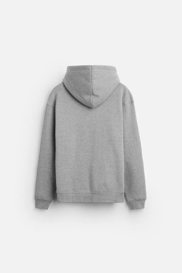 sudadera gris jaspeada